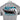 Close-up of the back of a grey T-shirt with a graphic of a boat with the text 'BRAVE THE WAVE' and a Yar-Craft logo.